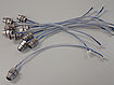 Assembled Phoenix connector M12 with Würth connector and plastic spiral.