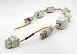 Cable with jack plugs and ferrite cores