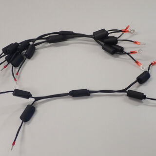 Small cable tree with Ölflex Heat 260SC and shrinked ferrite core. End with ferrules and plug terminals.