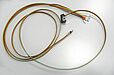 Ribbon cable with ferrules and IDC-connector, strain relief